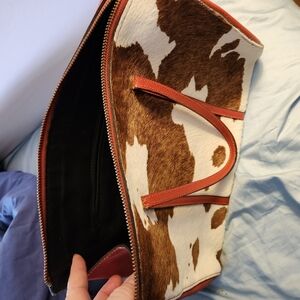 Iccu hair on leather coated handbag